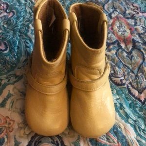 Soft bottom leather riding boots.